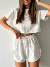 Ladies' Simple Hollow Out Solid Color Short Sleeve Top And Shorts Set
